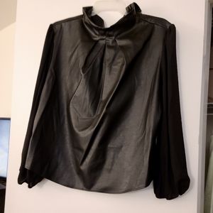 Pleather top with sheer black sleeves